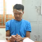 Đối tượng Trần Hoàng Diệu tại cơ quan điều tra. (Ảnh: TTXVN phát)