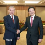 Thủ tướng Singapore, Tổng Thư ký Đảng Hành động nhân dân Singapore (PAP) Lawrence Wong đón Tổng Bí thư Tô Lâm. (Ảnh: Thống Nhất/TTXVN)