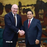 Thủ tướng Phạm Minh Chính tiếp Tổng giám đốc Hãng Thông tấn TASS (Liên bang Nga) Andrey Kondrashov. (Ảnh: Dương Giang/TTXVN)