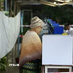 Cử tri bỏ phiếu trong giai đoạn 3 của cuộc tổng tuyển cử tại Yangon, Myanmar, ngày 25/1/2026. (Ảnh: THX/TTXVN)