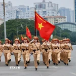 Cán bộ, chiến sỹ Cảnh sát giao thông Hà Nội tham gia các khối diễu hành, phục vụ Lễ xuất quân và diễn tập phương án bảo vệ Đại hội XIV của Đảng. (Ảnh: TTXVN phát)