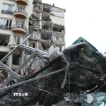 Cảnh đổ nát sau cuộc không kích tại Tehran, Iran, ngày 23/3/2026. (Ảnh: THX/TTXVN)