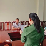 Làm việc với Phòng An ninh mạng và phòng, chống tội phạm sử dụng công nghệ cao, đối tượng L.Q.Đ đã thừa nhận những thông tin mà mình cung cấp trên mạng xã hội là hoàn toàn sai sự thật. (Ảnh: TTXVN phát)