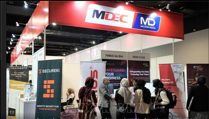 Gian hàng trưng bày của Tập đoàn Kinh tế kỹ thuật số Malaysia (MDEC) tại một triển lãm. (Nguồn: TTXVN)