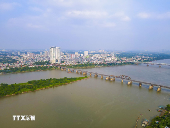 Et hjørne av Red River. (Foto: VNA) ttxvn-du-lich-song-hong3.jpg