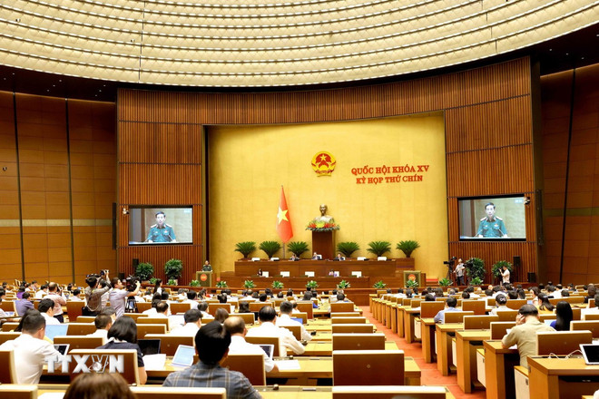 ttxvn-ky-hop-thu-9-quoc-hoi-khoa-xv-thao-luan-o-hoi-truong-ve-du-an-luat-vn-tham-gia-gin-giu-hoa-binh-lhq3.jpg