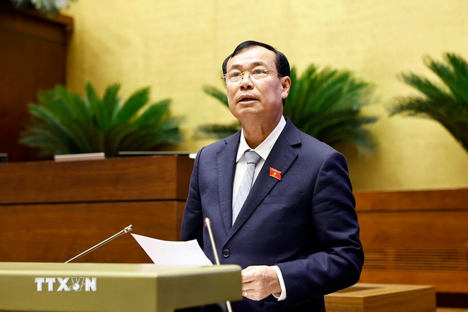 ttxvn-ky-hop-thu-9-quoc-hoi-khoa-xv-thao-luan-o-hoi-truong-ve-du-an-luat-vn-tham-gia-gin-giu-hoa-binh-lhq2.jpg