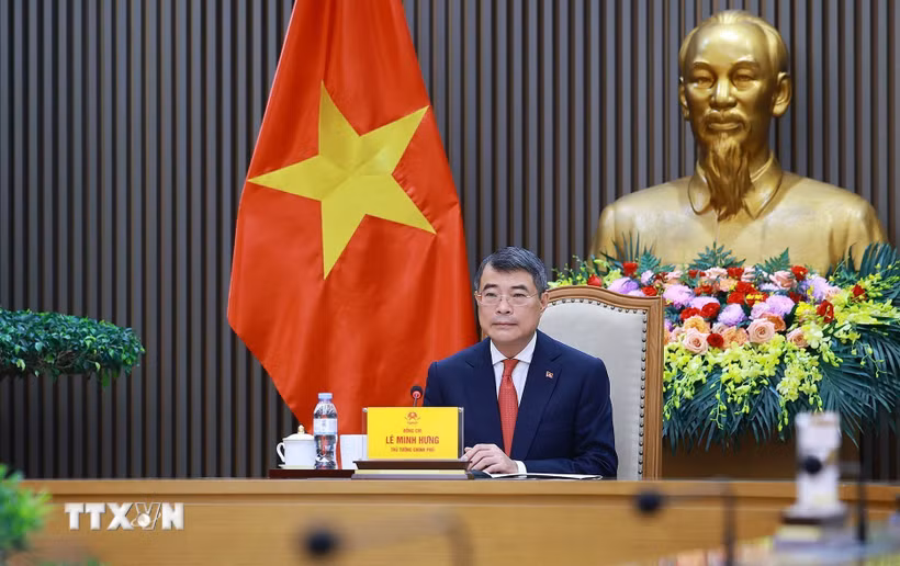 Thủ tướng Lê Minh Hưng điện đàm với Thủ tướng Đức Friedrich Merz. (Ảnh: Dương Giang/TTXVN)