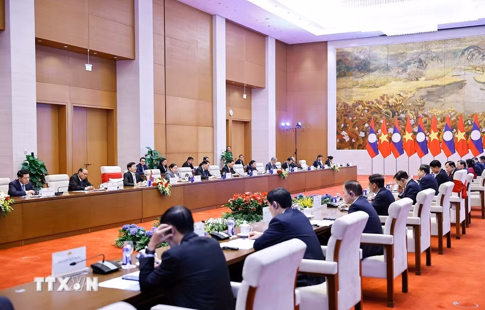 Chủ tịch Quốc hội Trần Thanh Mẫn hội kiến Tổng Bí thư, Chủ tịch nước Lào Thongloun Sisoulith. (Ảnh: Doãn Tấn/TTXVN)