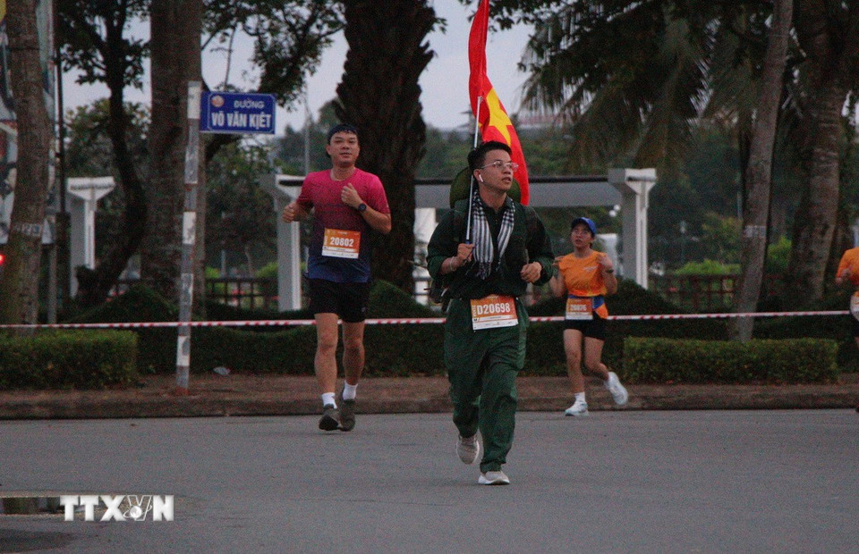 Cosplay hình ảnh chú bộ đội của vận động viên. (Ảnh: Nguyễn Hằng/TTXVN)