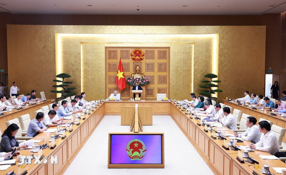 Thủ tướng Phạm Minh Chính chủ trì họp đánh giá sơ kết 1 tháng vận hành chính quyền địa phương hai cấp. (Ảnh: Dương Giang/TTXVN)