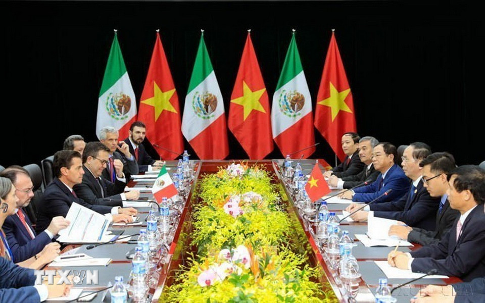 Trong khuôn khổ Tuần lễ Cấp cao APEC 2017, chiều 9/11/2017, tại Đà Nẵng, Chủ tịch nước Trần Đại Quang gặp song phương Tổng thống Mexico Enrique Peña Nieto. (Ảnh: TTXVN)