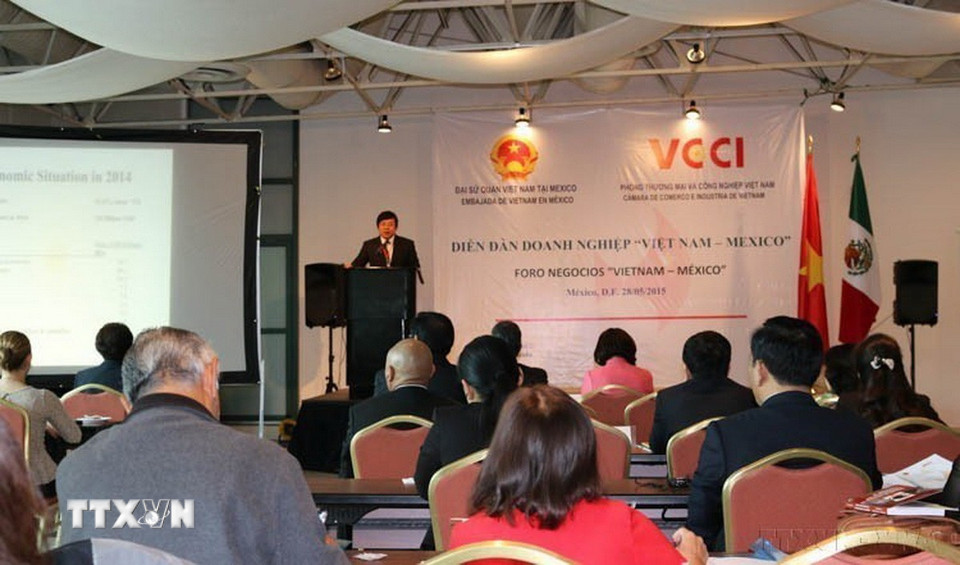 Diễn đàn doanh nghiệp Việt Nam-Mexico do Đại sứ quán Việt Nam, Phòng Thương mại và Công nghiệp Việt Nam phối hợp với Hội đồng Doanh nghiệp Ngoại thương, Đầu tư và Công nghệ Mexico (COMCE) tổ chức (29/5/2015). (Ảnh: Việt Hòa/TTXVN)