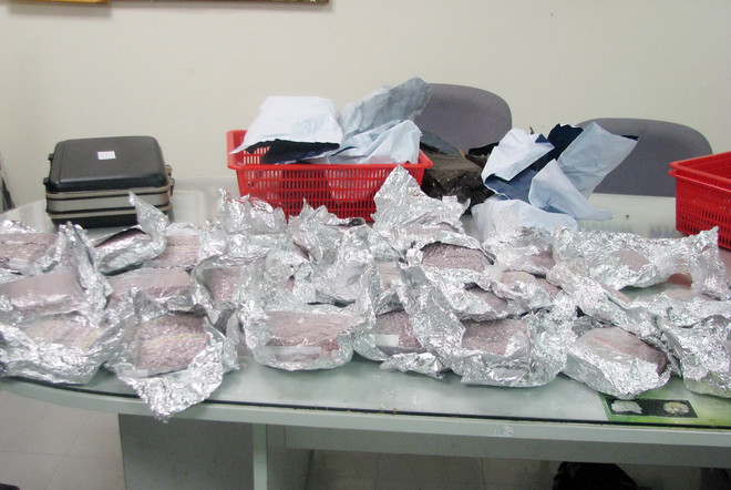 Phá vụ vận chuyển 10.000 viên ma túy từ Lào vào Việt Nam ảnh 1