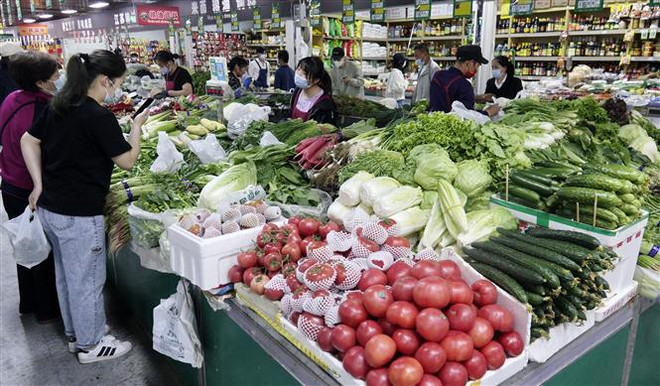 Trung Quốc: Thượng Hải và Bắc Kinh nới lỏng các biện pháp phong tỏa ảnh 2