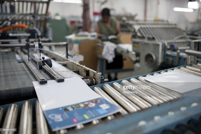 Mỹ quyết định bỏ thuế nhập khẩu đối với giấy in của Canada ảnh 1