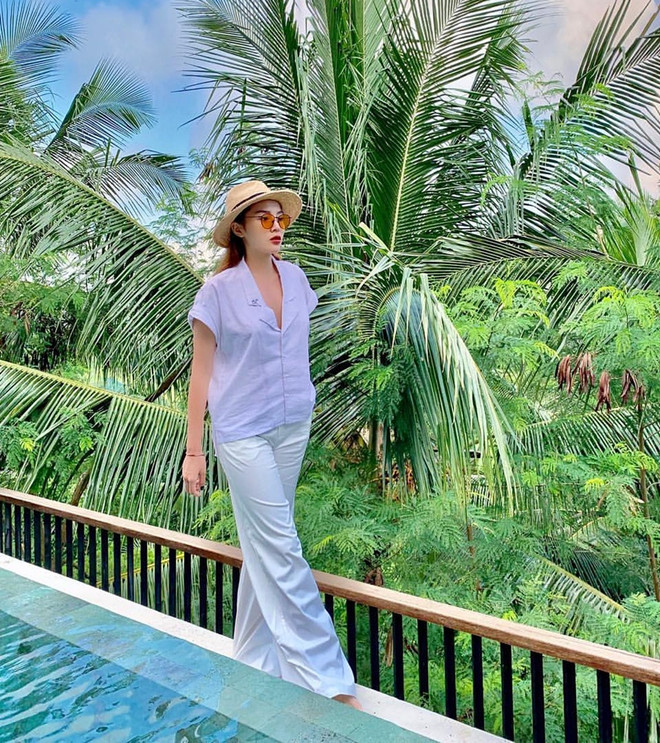 7 gợi ý phối trang phục với sơmi trắng cho mùa Hè từ các mỹ nhân Việt ảnh 20