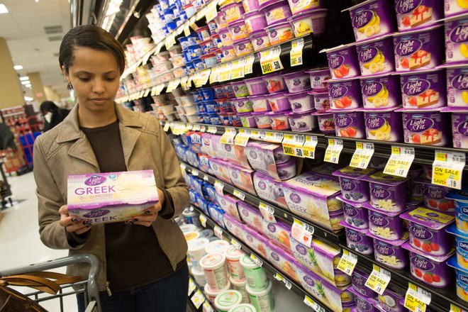 Kinh tế Mỹ tăng trưởng khiêm tốn do tiêu dùng trì trệ ảnh 1