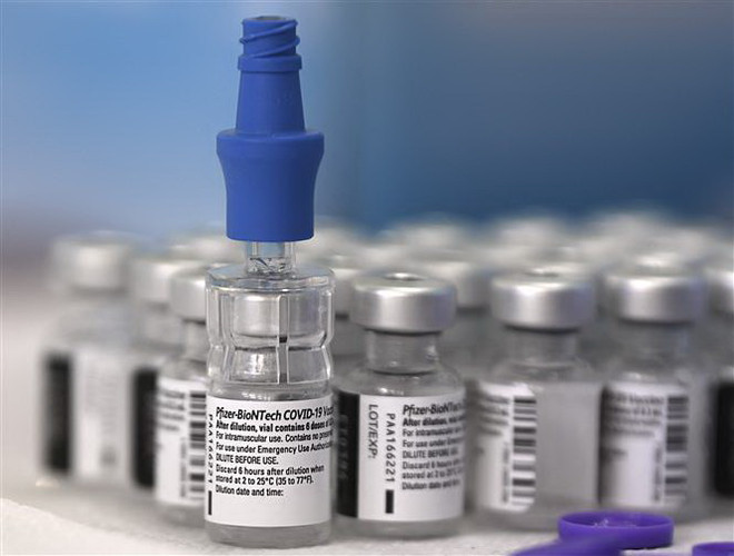 Mỹ dự kiến phê duyệt đầy đủ vaccine ngừa COVID-19 của Pfizer ảnh 1