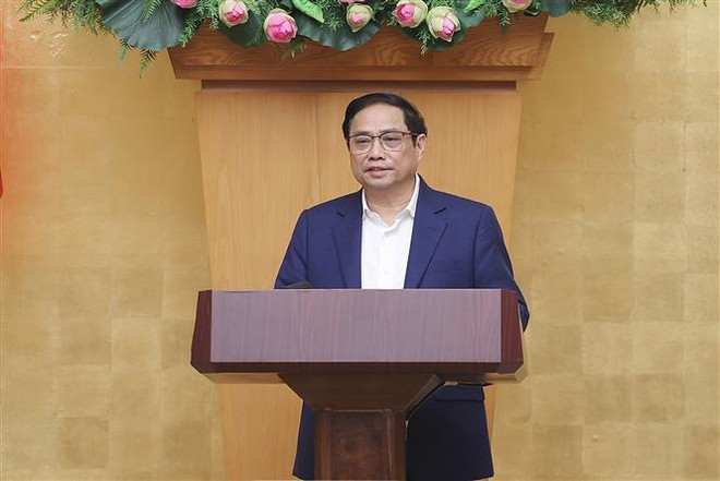 Thủ tướng Phạm Minh Chính chủ trì phiên họp. (Ảnh: Dương Giang/TTXVN) Thủ tướng chủ trì phiên họp chính phủ xây dựng pháp luật tháng 12 ảnh 3