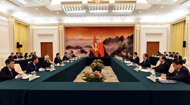 Trưởng Ban Tuyên giáo Trung ương Nguyễn Trọng Nghĩa hội kiến ông Vương Hộ Ninh, Ủy viên Thường vụ Bộ Chính trị, Chủ tịch Chính hiệp toàn quốc Trung Quốc. (Ảnh: Thành Dương/TTXVN) ttxvn-viet nam-trung quoc3.jpg