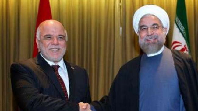 Tổng thống Hassan Rouhani (phải) và Thủ tướng Haidar al-Abadi trong một cuộc gặp hồi tháng Chín ở Mỹ. (Nguồn: presstv.ir) Thủ tướng Iraq đến Iran bàn cuộc chiến chống phiến quân IS ảnh 1