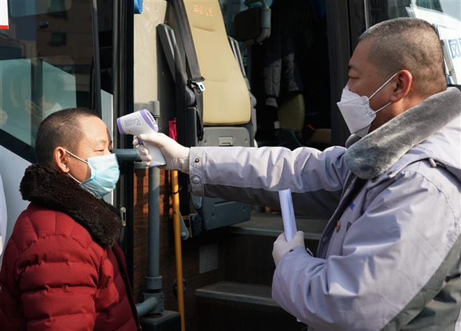 Trung Quốc cách ly 14 ngày toàn bộ hành khách quốc tế đến Bắc Kinh ảnh 1