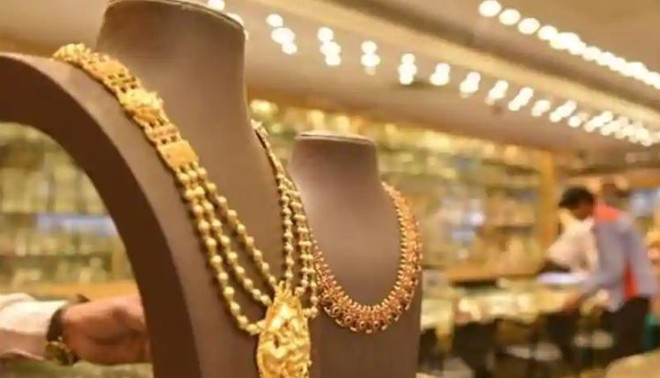 Đồng USD yếu, giá vàng châu Á đứng vững ở mức 1.800 USD ảnh 1