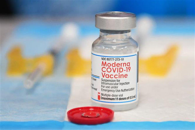 Vaccine ngừa COVID-19 của hãng dược phẩm Moderna. (Ảnh: AFP/TTXVN) Moderna kiện Pfizer/BioNTech vi phạm bằng sáng chế vaccine COVID-19 ảnh 1