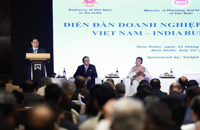 Thủ tướng Phạm Minh Chính phát biểu tại Diễn đàn Doanh nghiệp Việt Nam-Ấn Độ. (Ảnh: Dương Giang/TTXVN) ttxvn_thu_tuong_du_dien_dan_doanh_nghiep (5).jpg