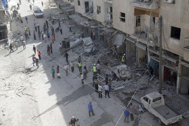 Nga xác nhận can thiệp quân sự vào Syria là để "cứu" ông Assad ảnh 1