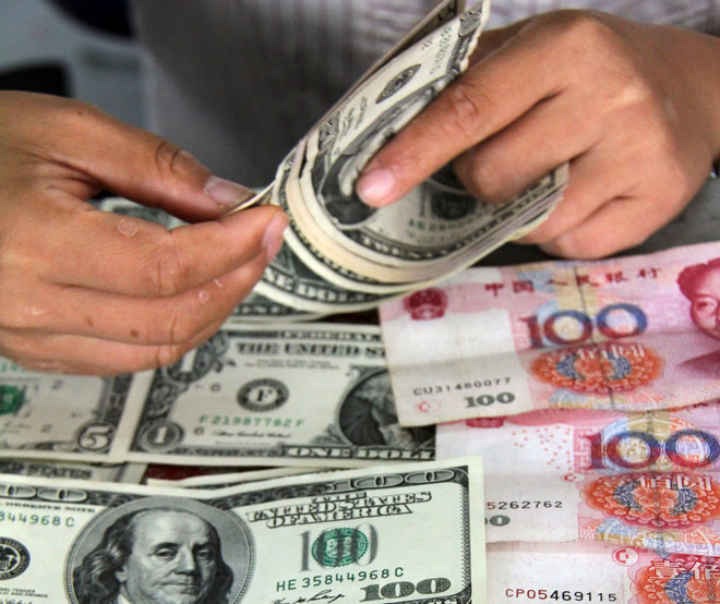 Dự trữ ngoại tệ của Trung Quốc giảm tháng thứ ba liên tiếp ảnh 1