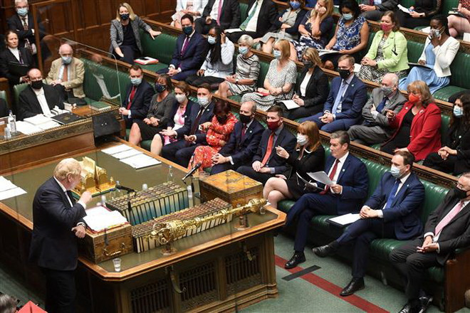 Anh: Tỷ lệ ủng hộ đảng Bảo thủ xuống thấp nhất sau khi tăng thuế ảnh 1