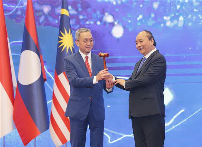Năm ASEAN "khó khăn không chùn bước, thách thức chẳng sờn lòng" ảnh 1