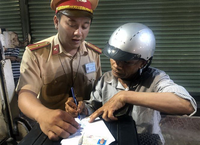 Thí điểm nộp phạt vi phạm giao thông qua Cổng dịch vụ công quốc gia ảnh 1