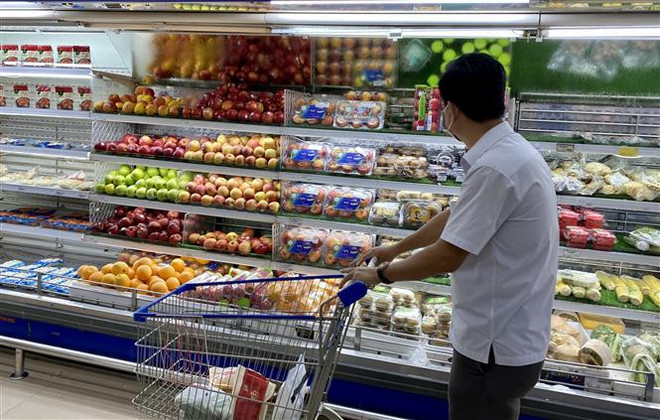 Thành phố Hồ Chí Minh mở cửa trở lại hoạt động bán lẻ tại "vùng xanh" ảnh 1