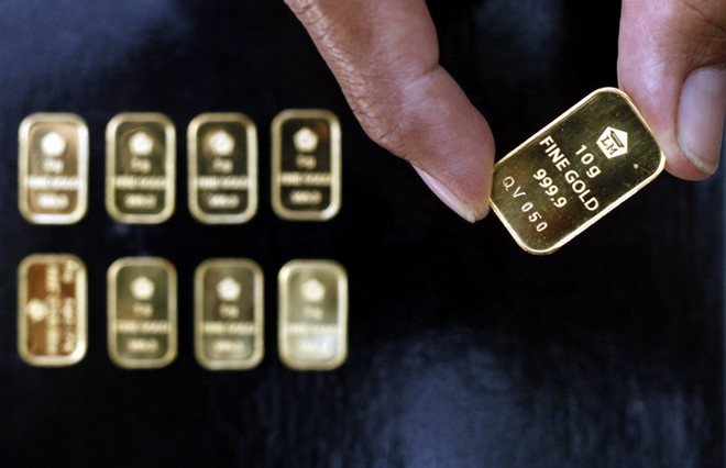 Giá vàng châu Á nới rộng đà tăng trong phiên giao dịch đầu tuần ảnh 1