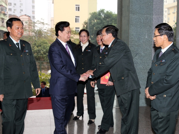 Thủ tướng Nguyễn Tấn Dũng đến dự Hội nghị triển khai nhiệm vụ ngành Thanh tra năm 2014. (Ảnh: Đức Tám - TTXVN) Năm 2013: Thanh tra ra hơn 300.000 tỷ đồng sai phạm ảnh 1