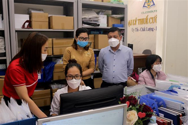 Nhiều chính sách kinh tế mới bắt đầu có hiệu lực từ tháng 7 ảnh 1