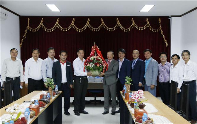 Đại sứ Việt Nam chúc mừng Hội Nhà báo Lào nhân ngày kỷ niệm ảnh 1