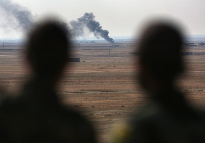 Mỹ trừng phạt ba đối tượng cung cấp nguồn tài chính cho IS ảnh 1