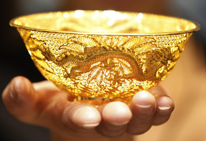 Giá vàng giảm gần 2% do ảnh hưởng từ thị trường dầu mỏ ảnh 1