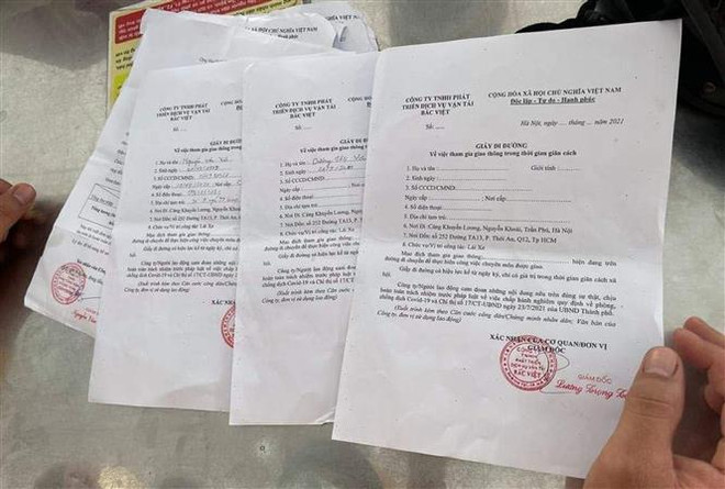 (Ảnh minh họa. Nguồn: TTXVN phát) TP. HCM bắt đối tượng làm giả và bán các loại giấy tờ để "thông chốt" ảnh 1