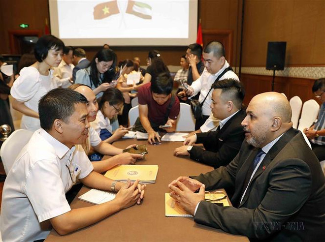 Diễn đàn Doanh nghiệp Việt Nam-UAE thu hút sự tham gia của đại diện hàng trăm doanh nghiệp hai nước (Hà Nội, 5/6/2023). (Ảnh: Trần Việt/TTXVN) Quan hệ hợp tác Việt Nam-UAE có những bước phát triển vượt bậc ảnh 3