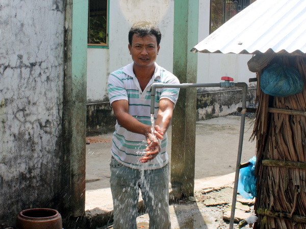 Ảnh minh họa. (Nguồn: Lê Sen/TTXVN) Thêm 60.000 hộ dân ngoại thành Hà Nội được dùng nước sạch ảnh 1