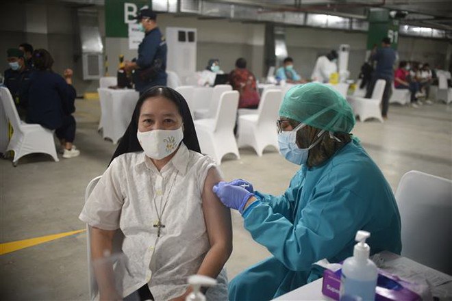 COVID-19: Indonesia có thể miễn dịch cộng đồng trong tương lai gần ảnh 1