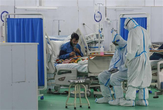 Tỷ lệ lây nhiễm COVID-19 giảm, Ấn Độ dần trở lại nhịp sống bình thường ảnh 1