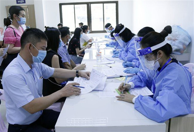 COVID-19: Đại sứ quán tại Lào kêu gọi cộng đồng người Việt bình tĩnh ảnh 1