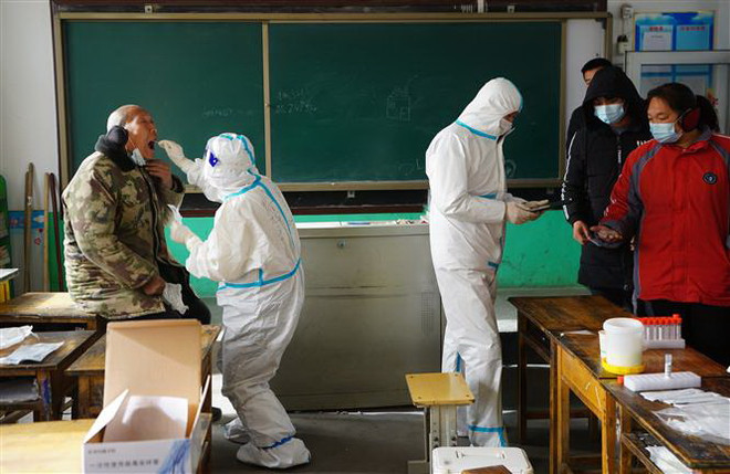 COVID-19: Trung Quốc đưa 20.000 dân ở quanh Thạch Gia Trang đi cách ly ảnh 1