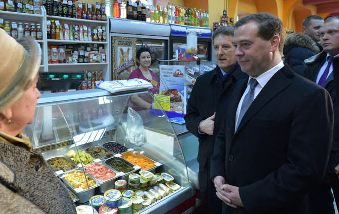 Trừng phạt Nga có thể được dỡ bỏ sớm nhất vào cuối 2015 ảnh 1